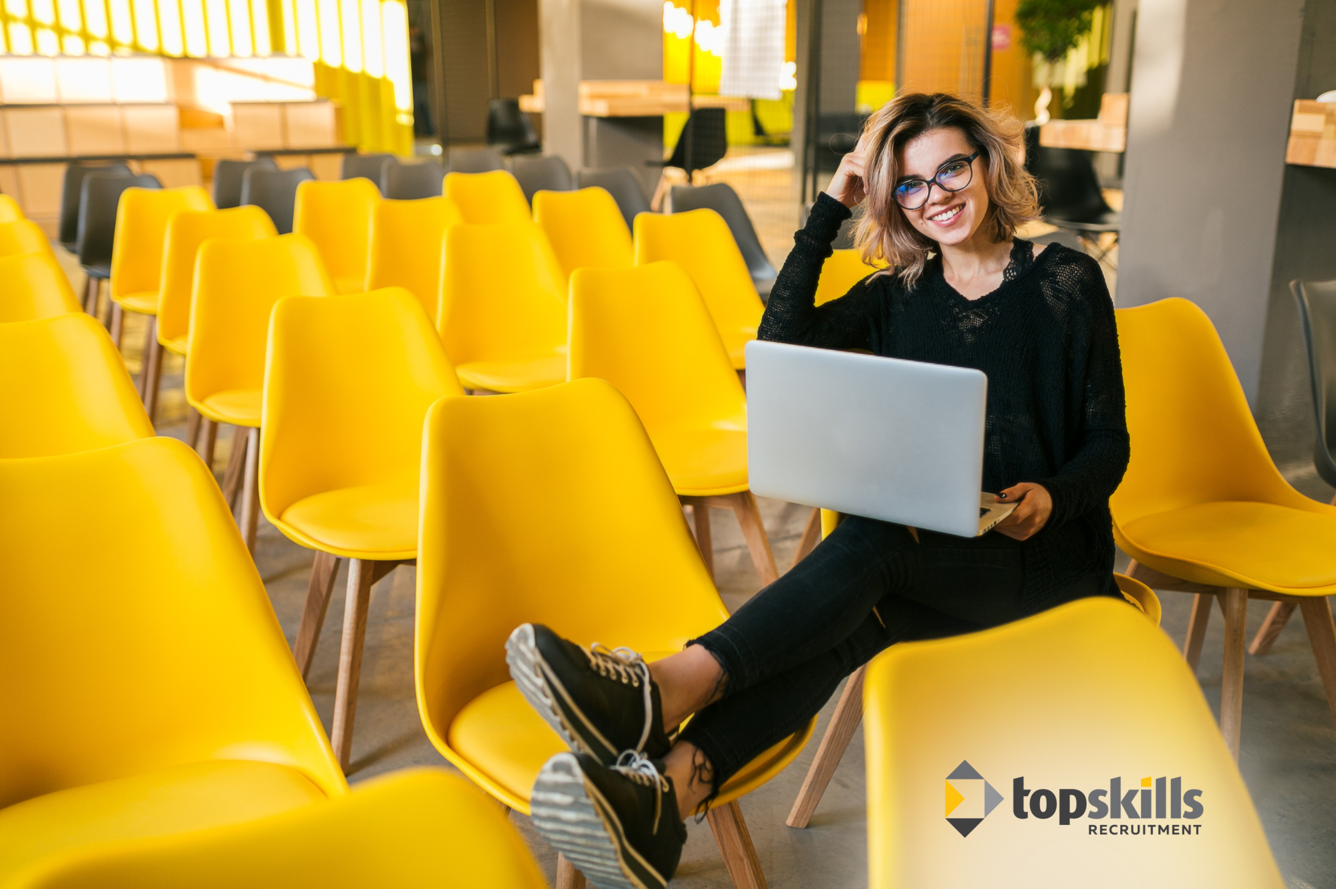 Top Skills recruiters sitting on yellow chairs